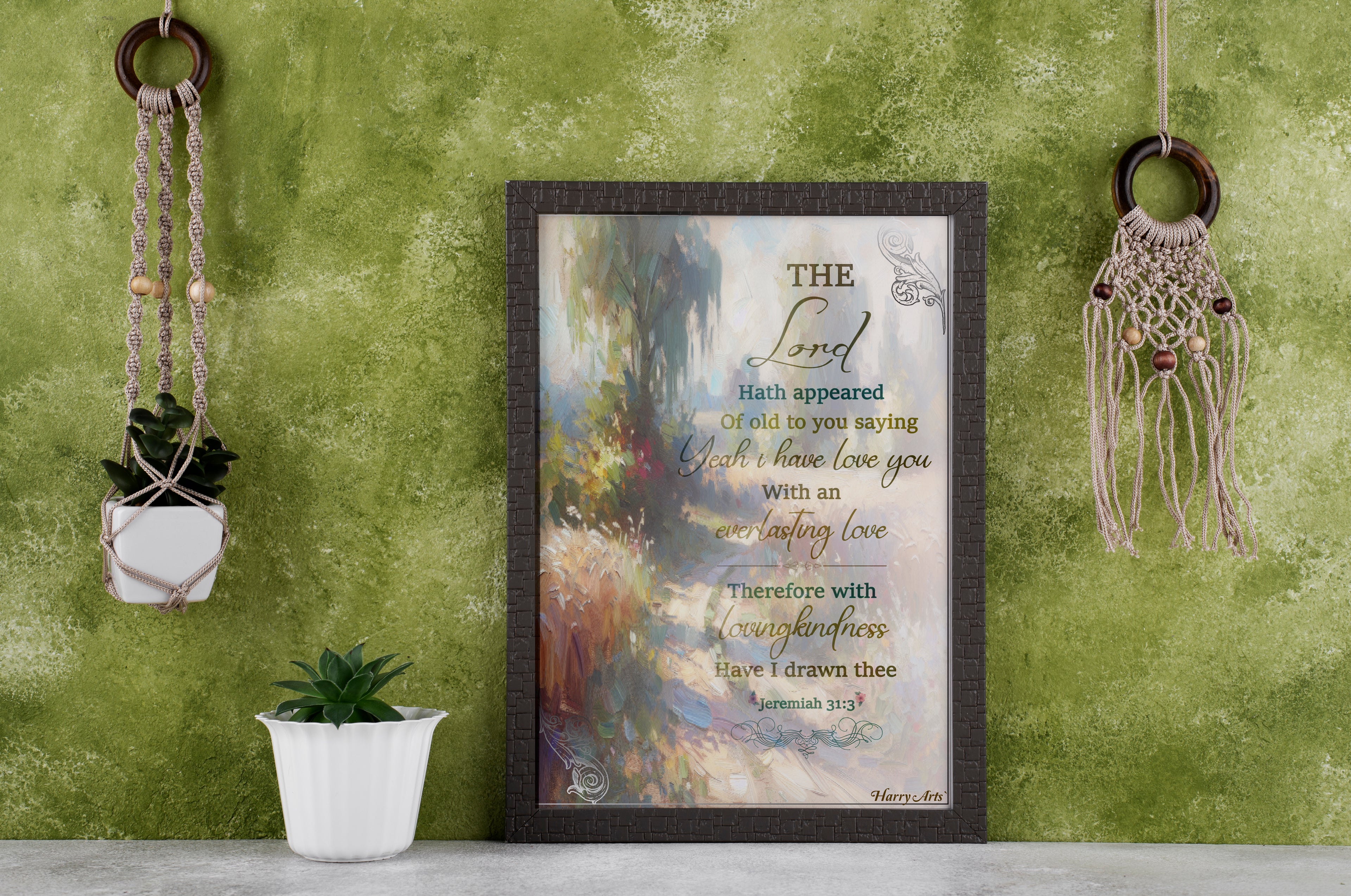Framed artwork with inspirational quote on a green wall with decorative elements.